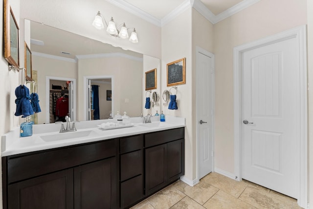 bathroom with vanity and ornamental molding