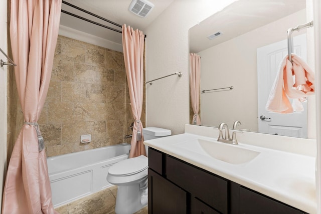 full bathroom featuring toilet, vanity, and shower / tub combo with curtain