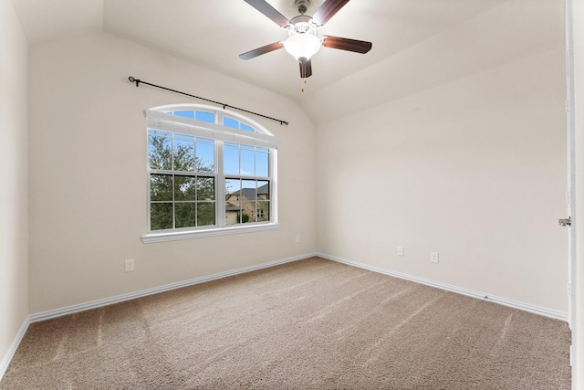 unfurnished room featuring carpet flooring, ceiling fan, and lofted ceiling