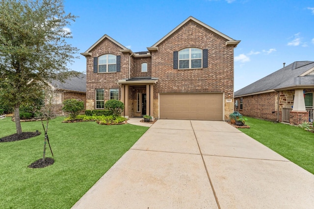 view of front of home with a garage and a front lawn