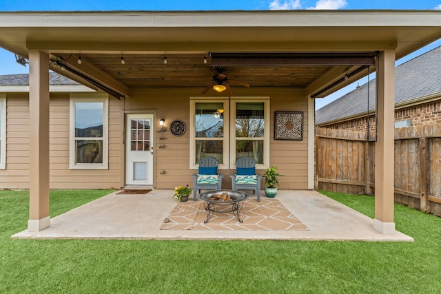 exterior space featuring ceiling fan