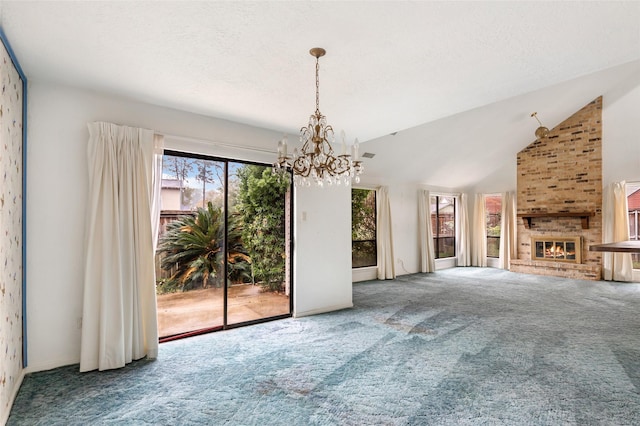 unfurnished living room with a brick fireplace, carpet, and high vaulted ceiling