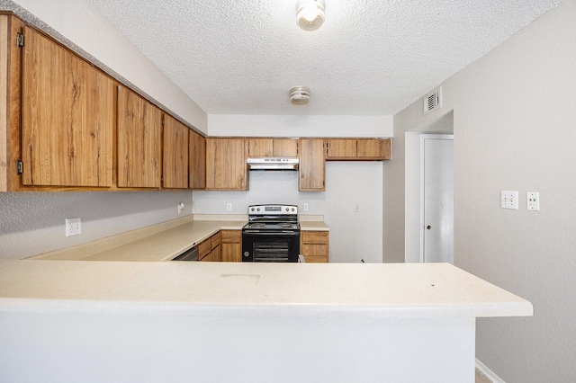 kitchen with a textured ceiling, kitchen peninsula, and range with electric cooktop