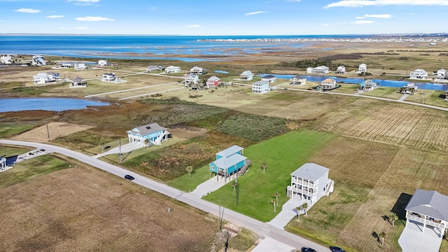 bird's eye view featuring a water view and a rural view