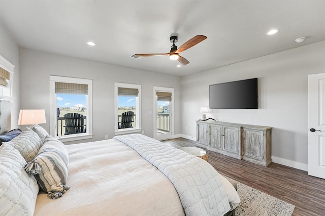 bedroom with ceiling fan, dark wood-type flooring, and access to outside