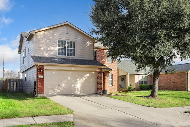 view of front property featuring a garage and a front lawn