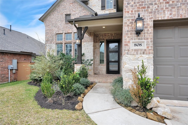 doorway to property featuring a garage