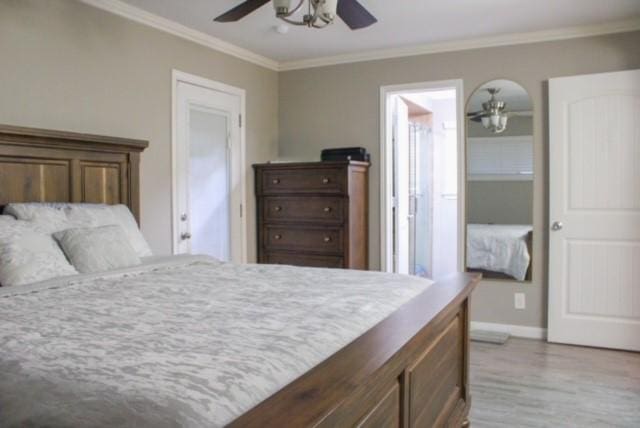 bedroom featuring ceiling fan, ornamental molding, and light hardwood / wood-style floors