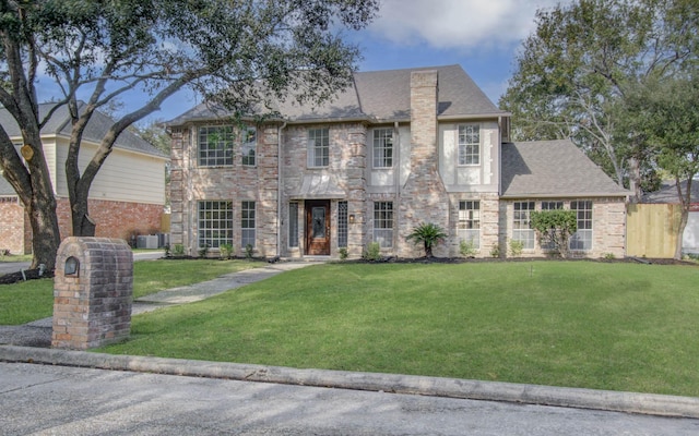 view of front of house with a front lawn