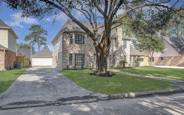 view of front facade featuring central AC, a front yard, an outdoor structure, and a garage