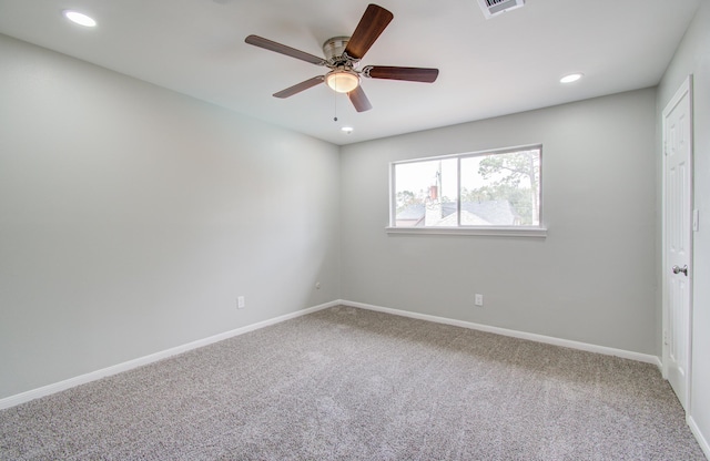 empty room with carpet and ceiling fan