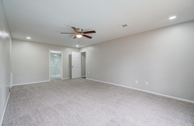 unfurnished room with carpet flooring and ceiling fan