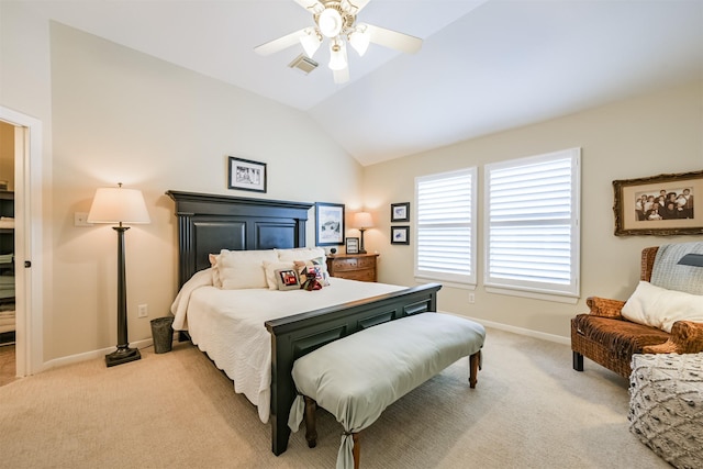 bedroom featuring ceiling fan, light carpet, and lofted ceiling