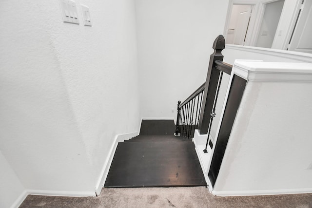 staircase with carpet