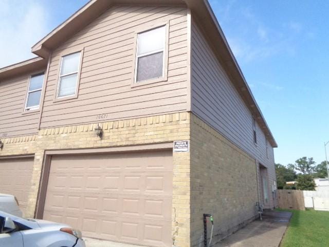 view of home's exterior with a garage