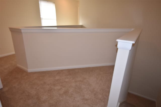 empty room with light colored carpet