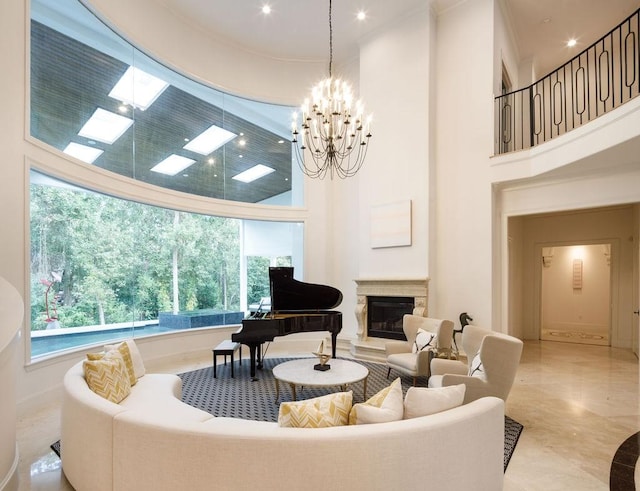 living room with a high ceiling and an inviting chandelier