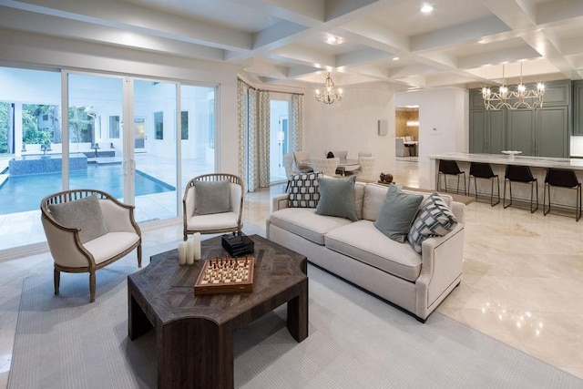 living room featuring beamed ceiling, an inviting chandelier, and coffered ceiling