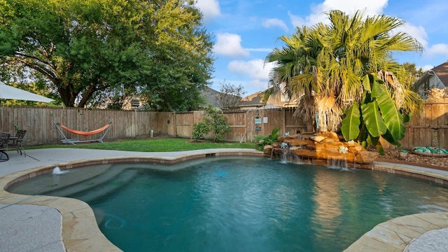 view of pool featuring pool water feature