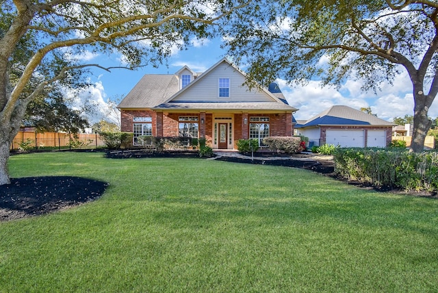 view of front of home with a front lawn and a garage