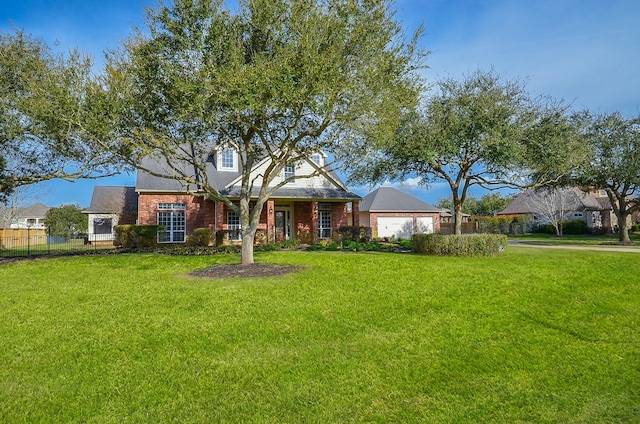 cape cod house featuring a front lawn, fence, and brick siding