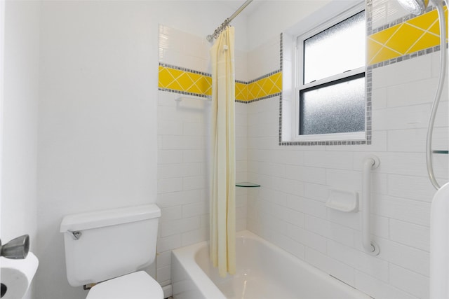 bathroom with toilet and shower / tub combo with curtain