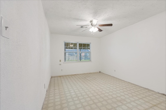 empty room with ceiling fan