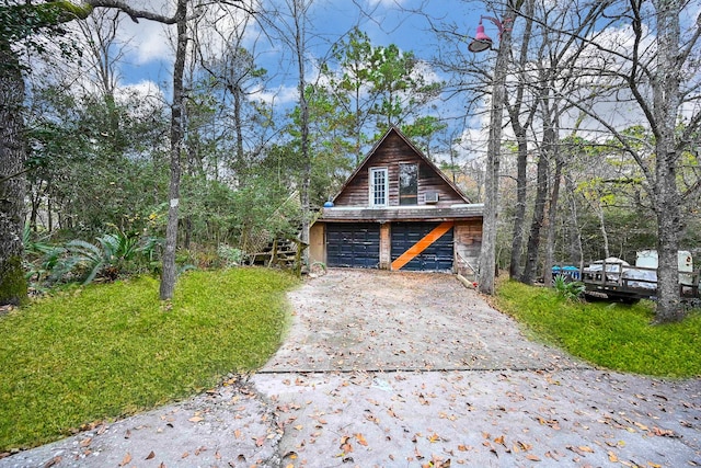 view of side of home featuring a garage