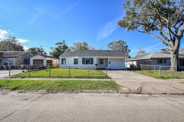 single story home with a garage and a front lawn