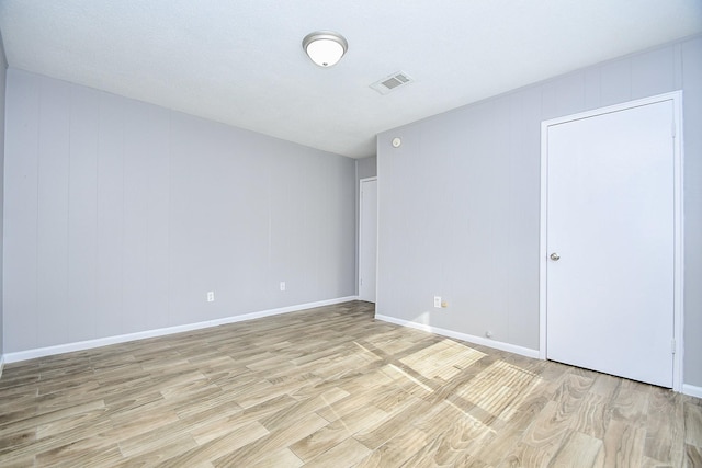 empty room featuring light hardwood / wood-style flooring