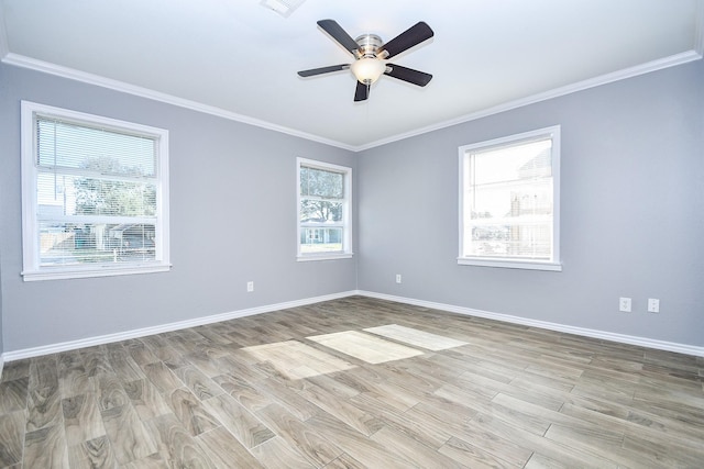 unfurnished room with ceiling fan, light wood-type flooring, and ornamental molding