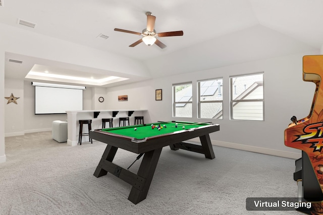 rec room featuring ceiling fan, light colored carpet, pool table, and a tray ceiling