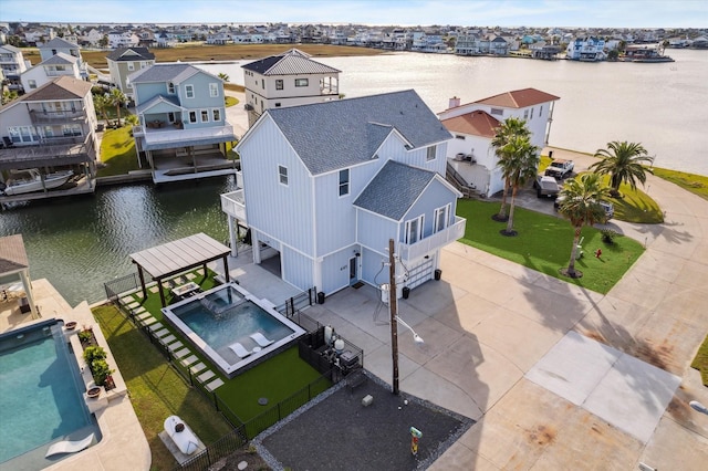 aerial view featuring a water view