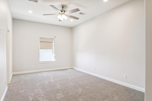 unfurnished room featuring carpet floors and ceiling fan