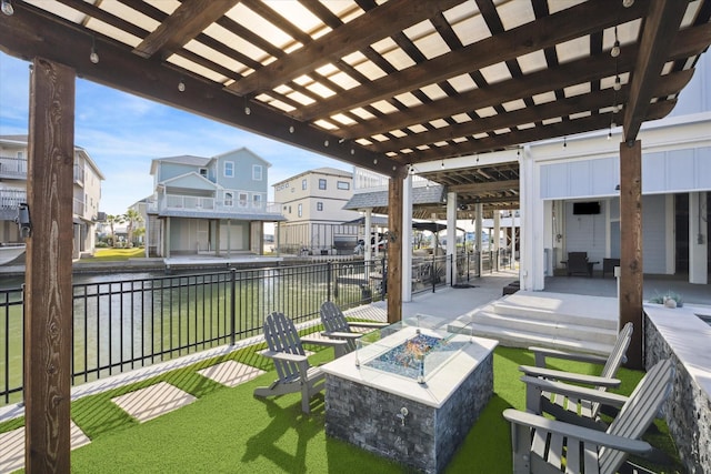 view of patio featuring a fire pit and a pergola