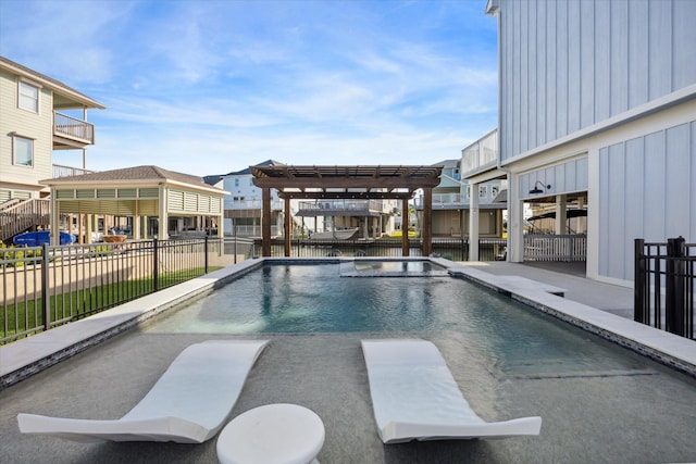 view of swimming pool with a pergola