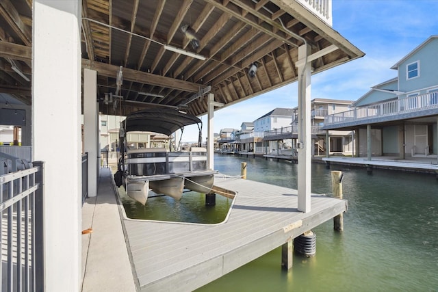 dock area featuring a water view