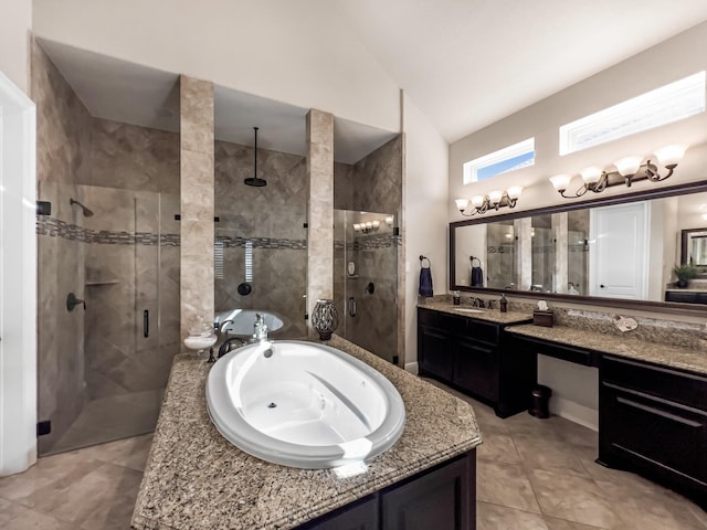 bathroom featuring tile patterned floors, vanity, vaulted ceiling, and shower with separate bathtub