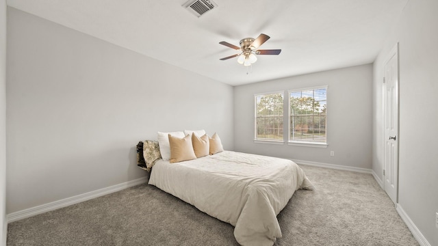 carpeted bedroom with ceiling fan