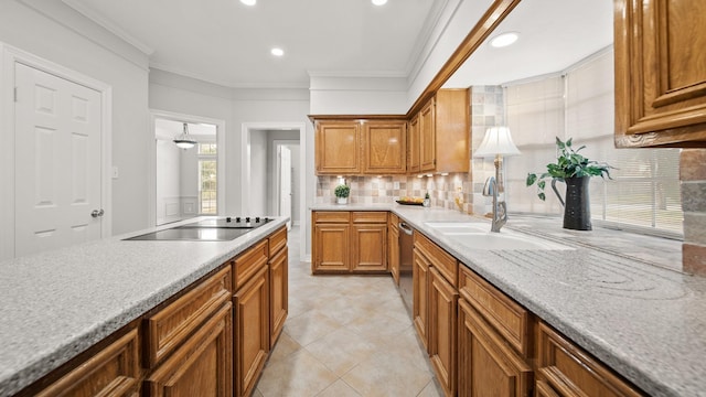 kitchen with backsplash, stainless steel dishwasher, black electric cooktop, crown molding, and sink