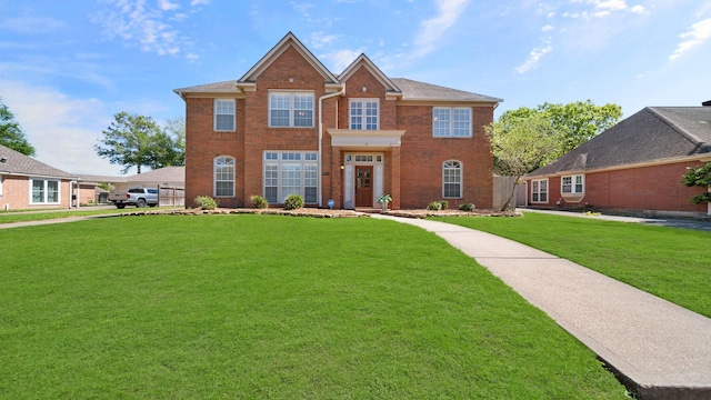 view of front of house with a front lawn