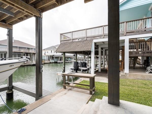 dock area featuring a water view