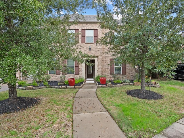 view of front of property with a front yard