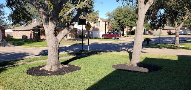 view of yard with a garage