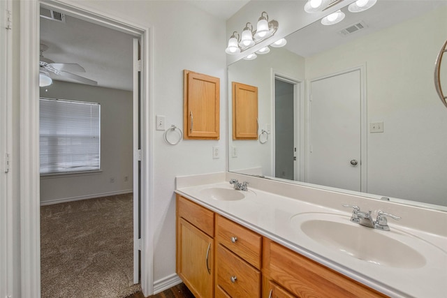 bathroom with vanity and ceiling fan