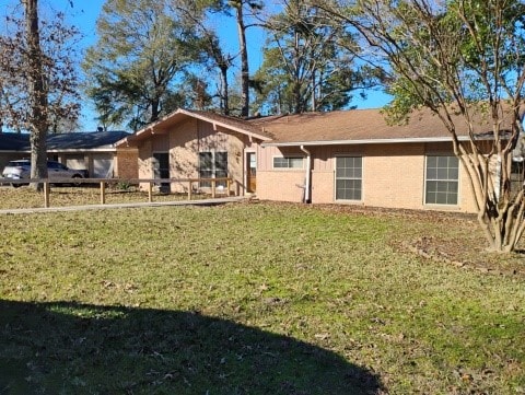 view of front of home with a front yard