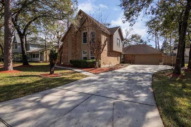 view of front of house with a front lawn and a garage