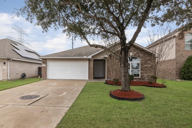 ranch-style home with a garage and a front lawn