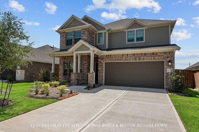 craftsman inspired home with a garage and a front yard