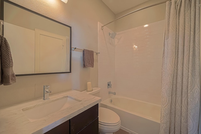 full bathroom featuring vanity, toilet, and shower / tub combo